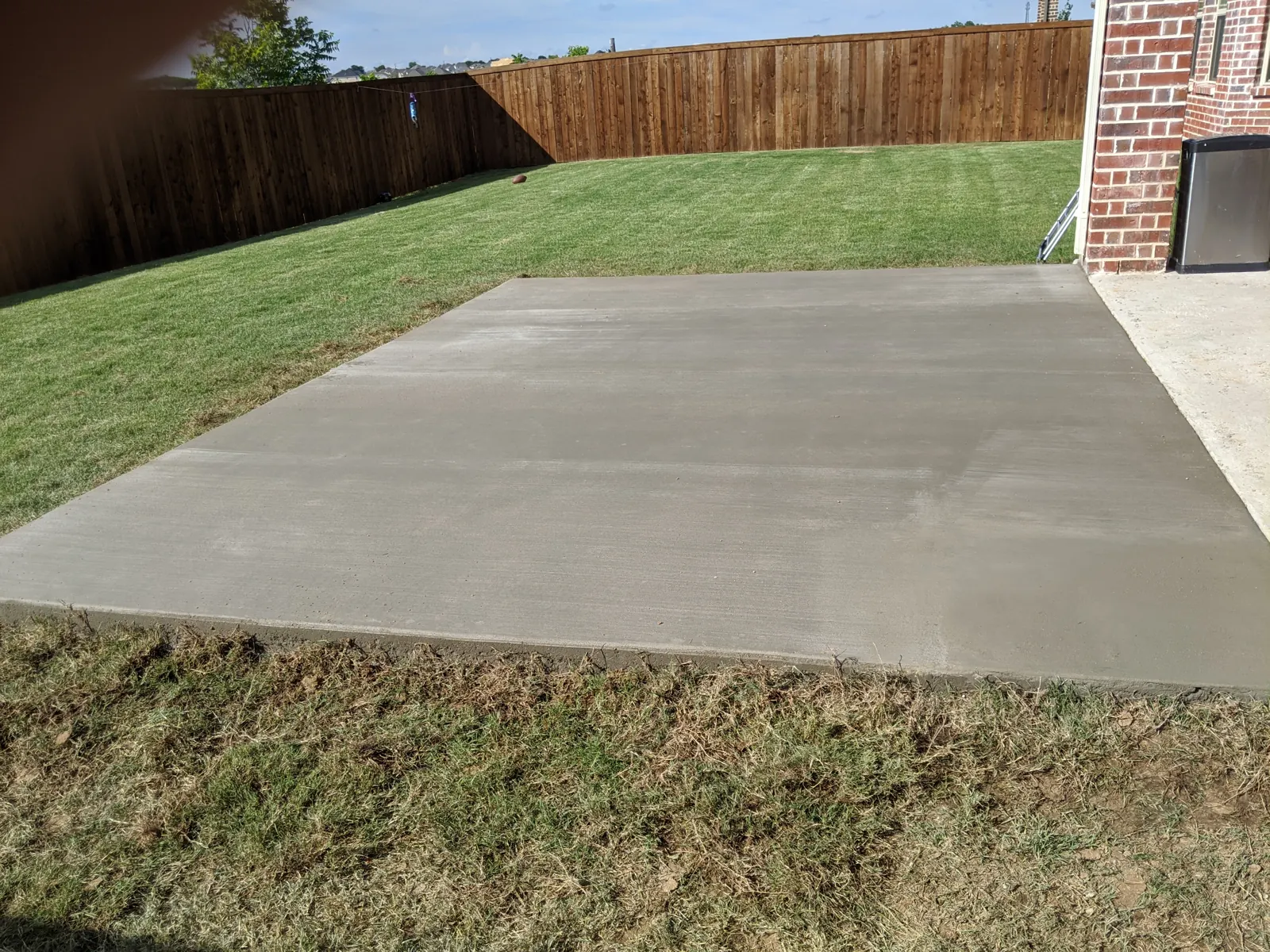 New patio slab added off an existing back porch