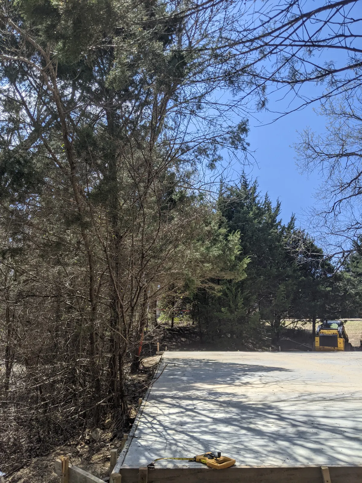 Finished slab on a wooded lot