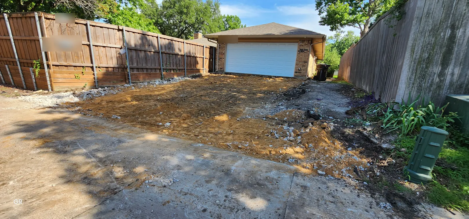 Old alley driveway broken out and graded before forming