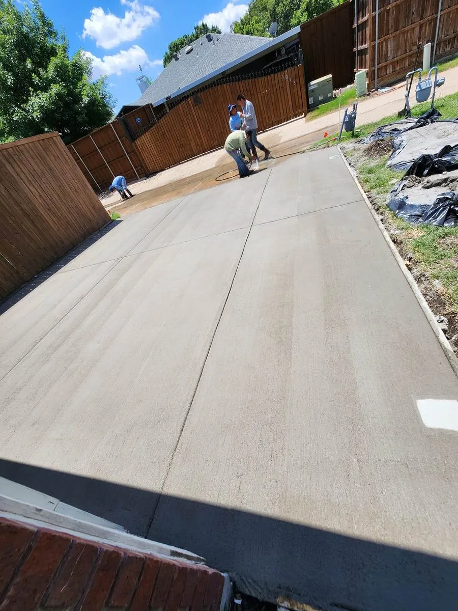 Freshly poured and finished concrete driveway